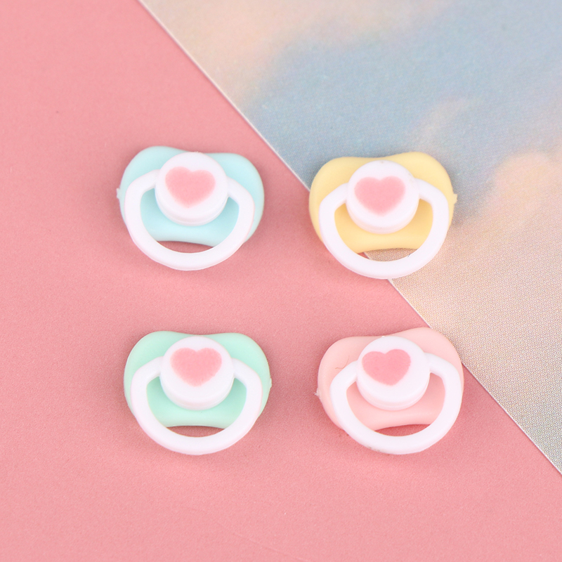 5Pcs Lovely Mini Doll Pacifier - Kids Toys House recension och pris